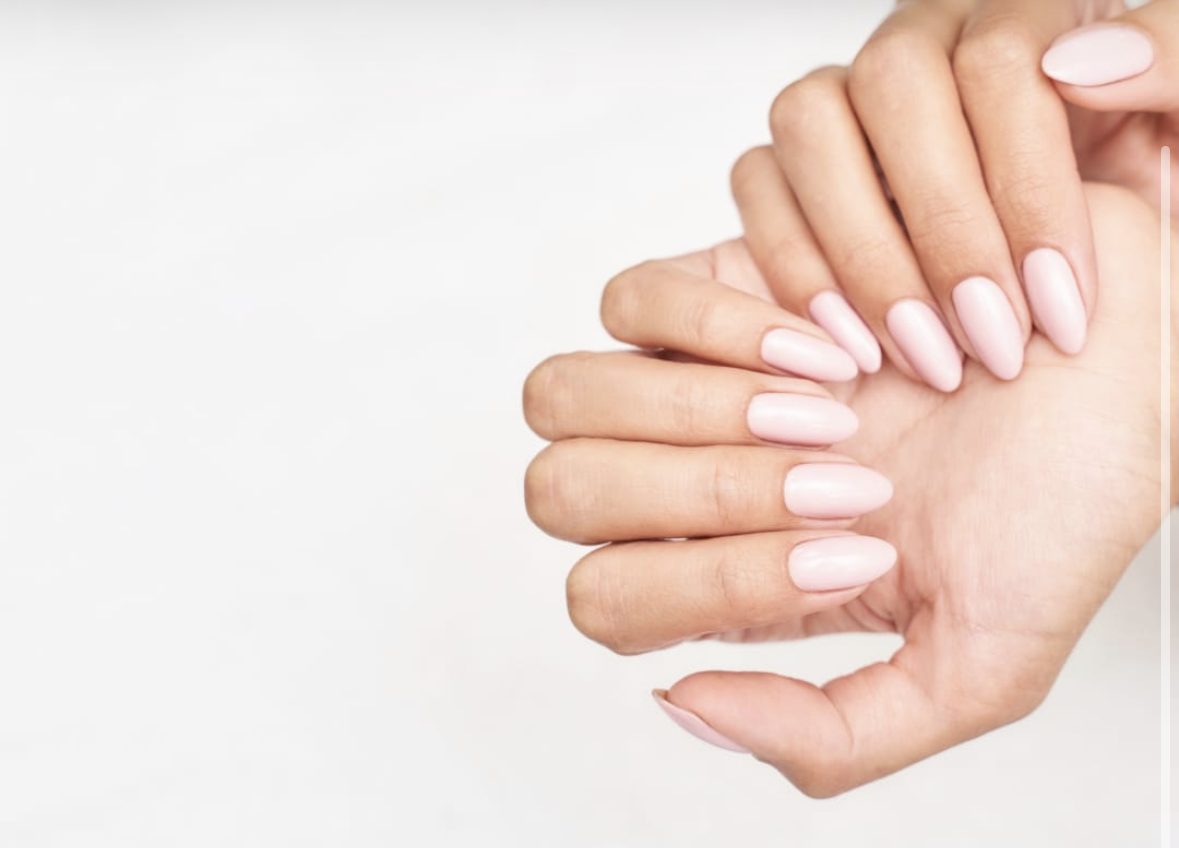 BIAB manicure finished with pink gel polish